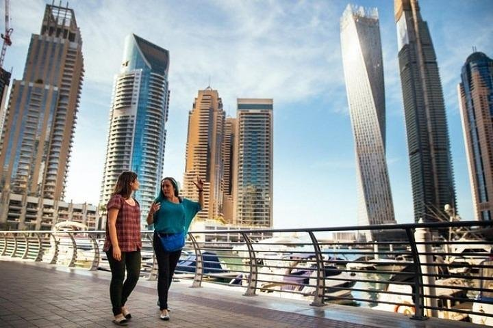 Explore Dubai's stunning skyline while strolling along its bustling waterfront. Discover a blend of history and modernity as you visit iconic landmarks and vibrant markets.